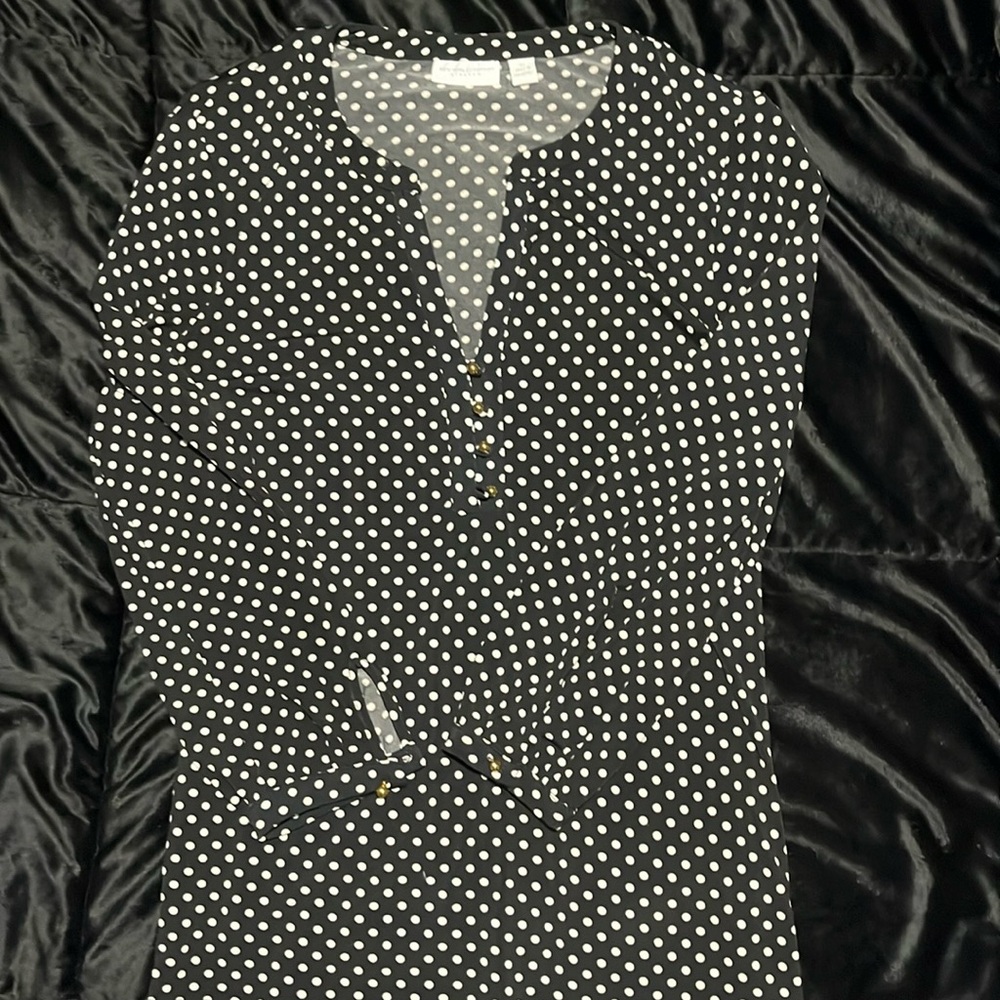 New York and company 
Cute, soft, stretchy blouse. No stains or rips.